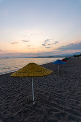 sunset beach sun beds parasol