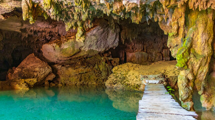 Amazing blue turquoise water and limestone cave sinkhole cenote Mexico.