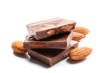 Pieces of tasty chocolate with almonds on white background