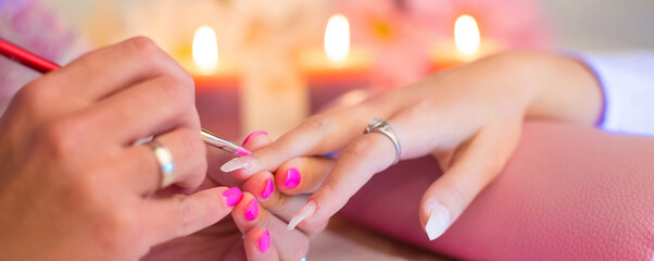 Manicure process in beauty salon, making of artificial nails