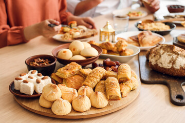 Traditional Eastern sweets on table. Celebration of Eid al-Fitr