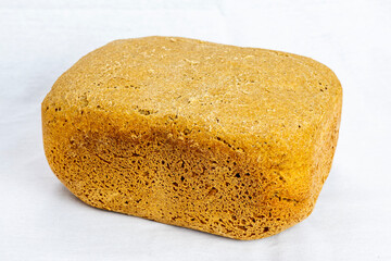 The freshly baked bread on a white background close-up. Making bread.