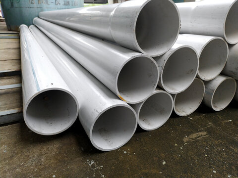 Pile of paralon pipes for industrial work. Indistrial pvc piping.