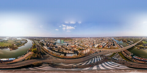 High Dynamic Range aerial 360 degrees panorama of Arnhem intersection roundabout. Urban development...