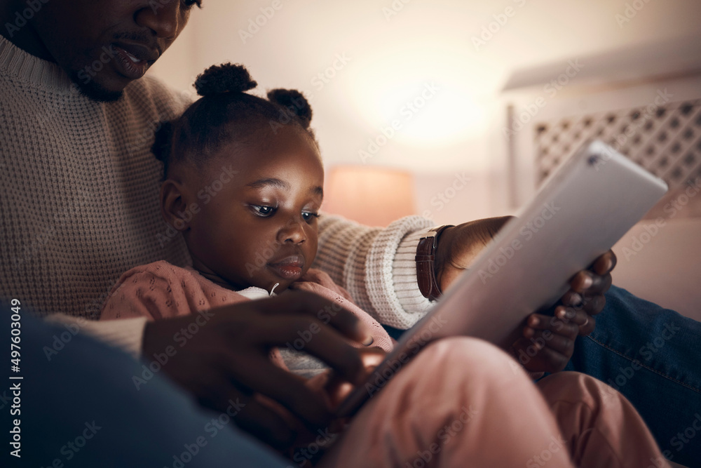 Canvas Prints Daddy read me a story please. Shot of a father reading his daughter bedtime stories.