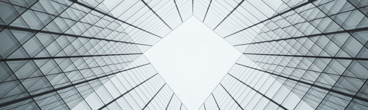 Business skyscraper gray glass building seen from the central patio