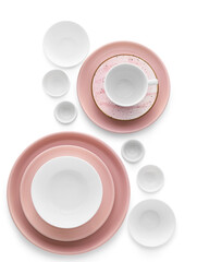 Set of stylish dinnerware on white background