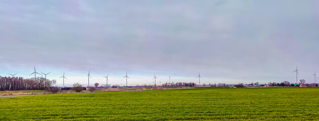 Electric wind turbine generating with blue sky and turbo generator