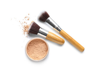 Powder and makeup brushes isolated on white