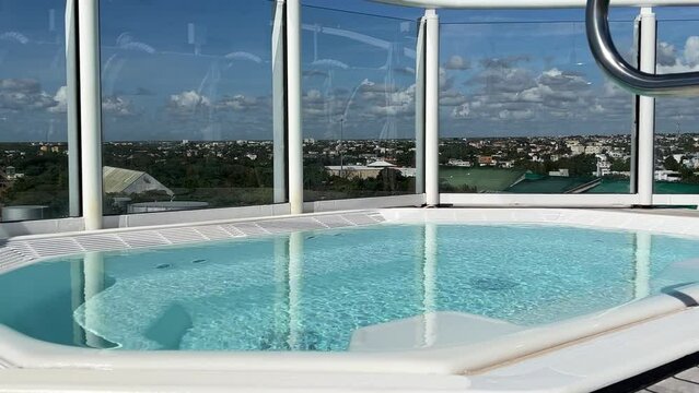 An outdoor sundeck hot tub on a cruise ship for the suite guests.