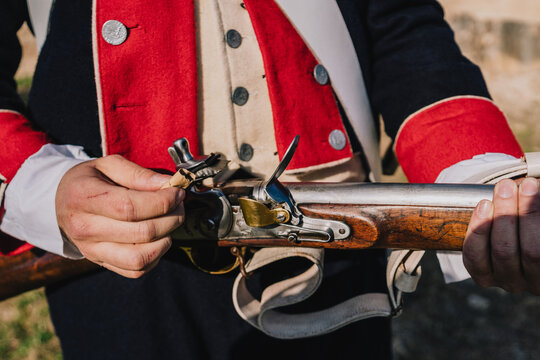 Soldier loading an old weapon. Napoleonic wars