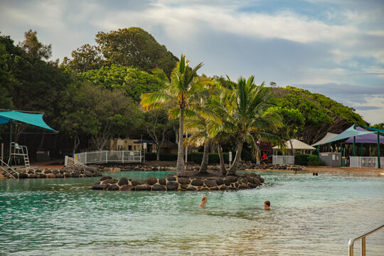 Kids swimming at the Settlement Cove Lagoon swimming pool in Redcliffe, QLD Australia