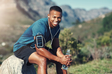 Resting for now before I get back to fitness. Cropped shot of handsome young male runner taking a...