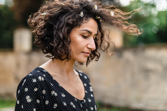 Beautiful Turkish woman with daisies in her hair