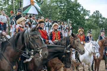 A man in a uniform on a horse