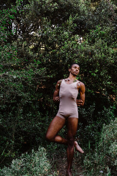 Portrait of expressive male dancer in nature 