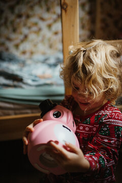 Young girl in her room with a night light