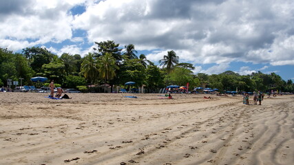 Tourists on the beach in Tamarindo, Guanacaste, Costa Rica