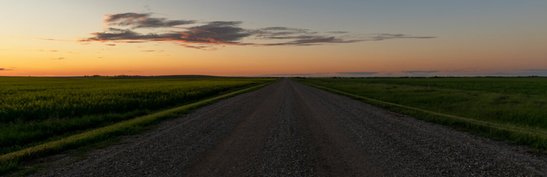 empty dirt road in prairie