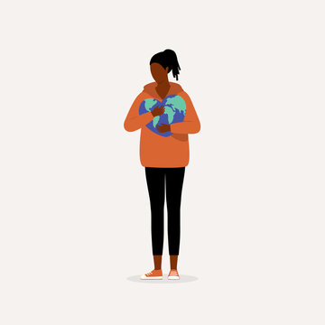 Love The Earth Concept. Young Black Woman Hugging A Heart Shape Planet Earth.