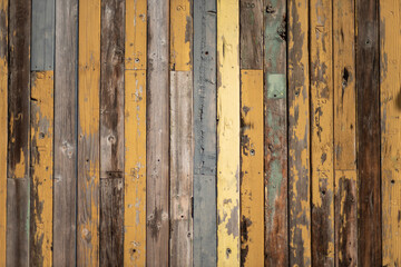 old colorful reclaimed wooden wall with various paint colors