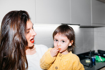 Woman and Little Girl in Kitchen 