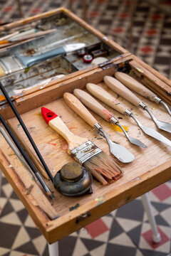Kit of various painting tools on table