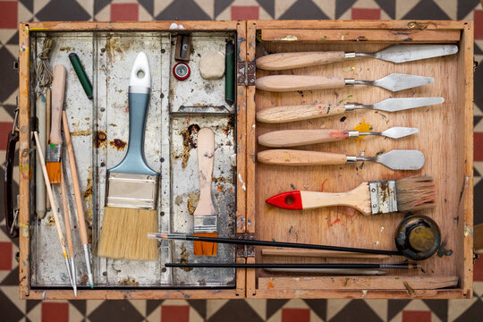 Kit of various painting tools on table