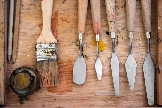 Kit of various painting tools on table