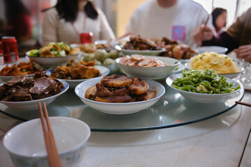 Family Eating Together For Chinese New Year At Home