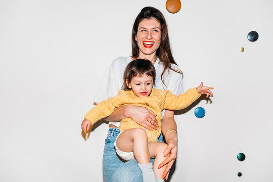 Woman Holding Baby Girl