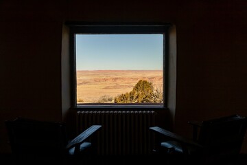 Painted desert viewed through window