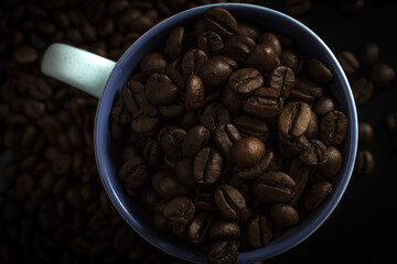 Cup full of coffee beans