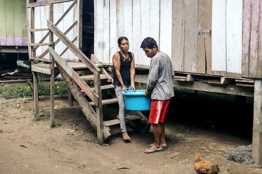Peruvian couple preparing the farina