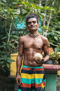 Portrait of a Native american man in a garden