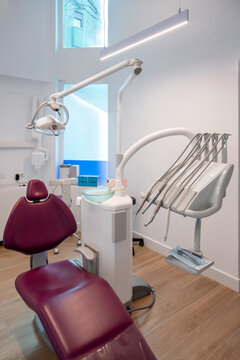 Dental chair with lam sink and tools in clinic