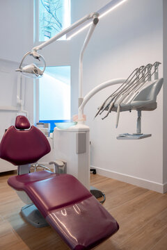 Dental chair with lam sink and tools in clinic