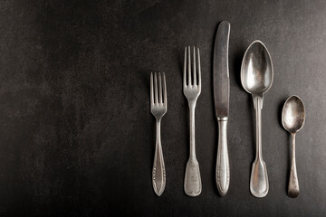 Antique cutlery on the table. Vintage cutlery.