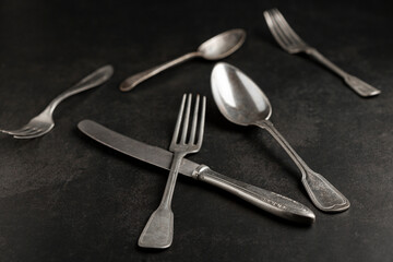 Antique cutlery on the table. Vintage cutlery.