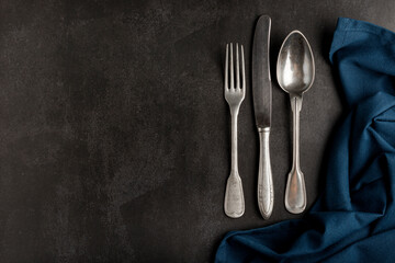 Antique cutlery on the table. Vintage cutlery.