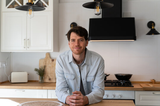 Portrait of confident man at home