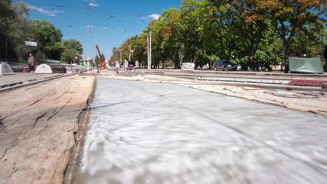 Road construction site with tram tracks repair and maintenance timelapse hyperlapse.