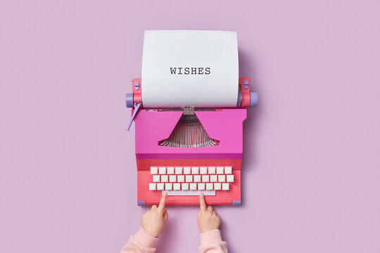 Kid using retro typewriter for writing letter