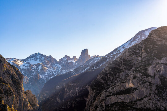 Rocky mountains covered with snow at Picos de Europa