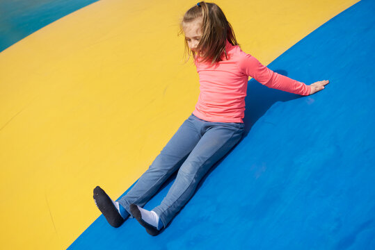 Little girl against a colorful background