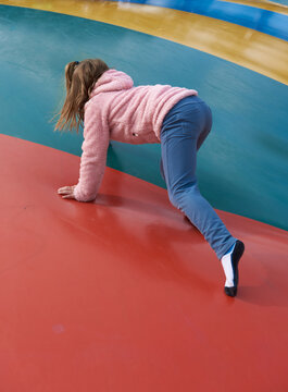 Little girl against a colorful background
