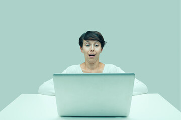 oh my god! what my eyes see! concept of surprised at laptop