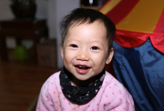 Closeup happy asian kid with tears