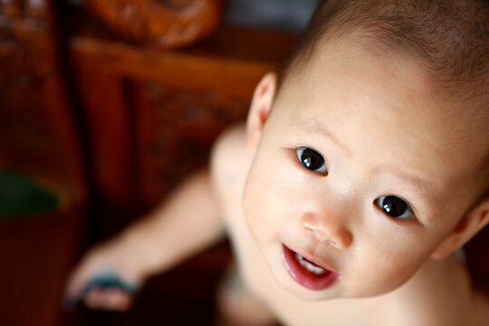 Closeup portrait of funny asian kid

