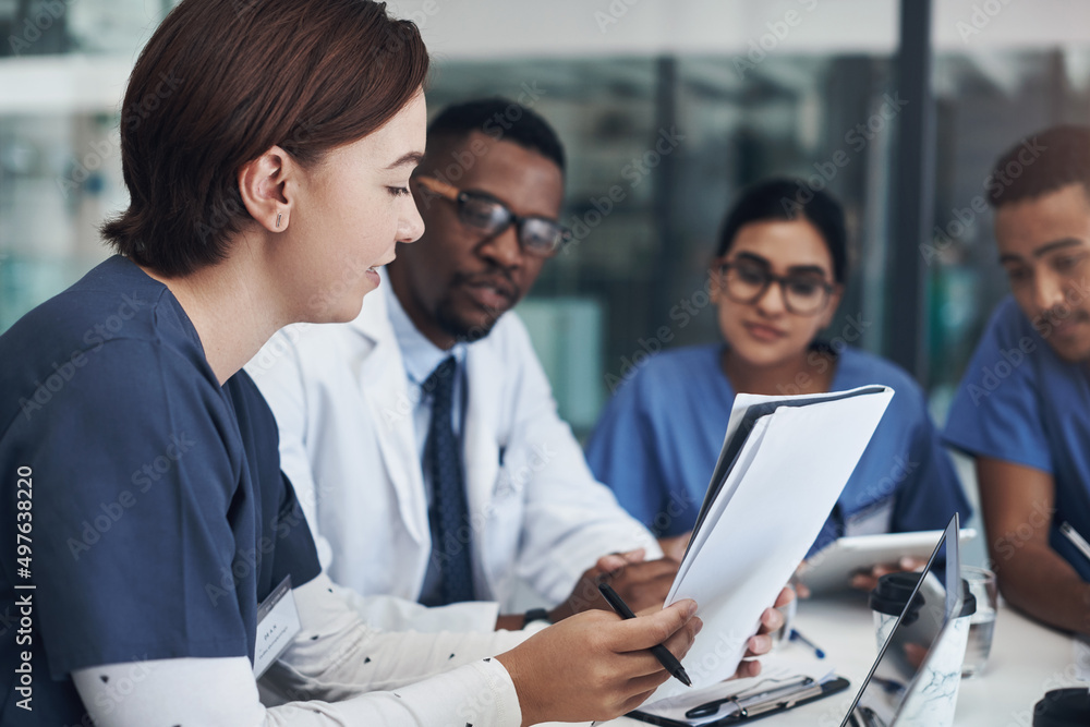 Aufkleber Implement those changes and we can see. Shot of a group of nurses and doctors having a meeting together.